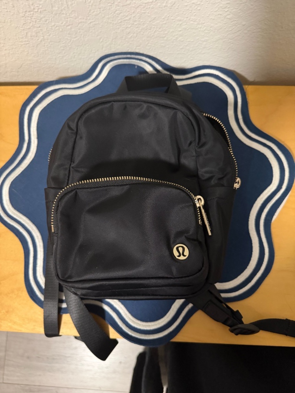 lululemon athletica Black Mini Backpack with Gold Accents 4L